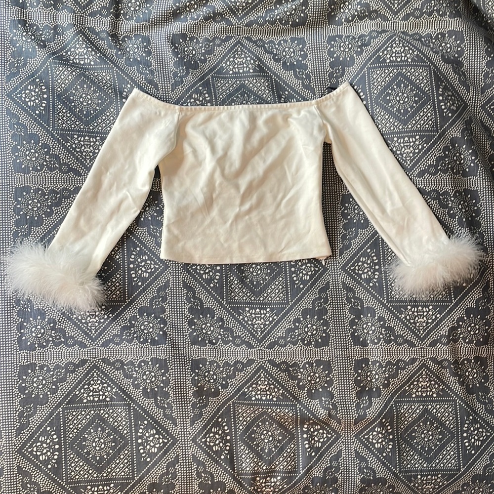Off The Shoulder White Tight Long Sleeve With Feathers At The End Of The Arms